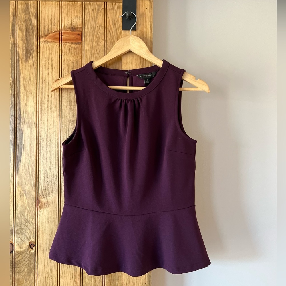 Banana Republic plum peplum top. NEW tags removed but never worn.